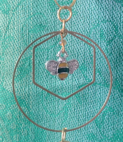 Handmade Suncatcher - GOLD CRESCENT WITH DARK AMBER DROPS, ORANGE BEADS AND BEE CHARMS